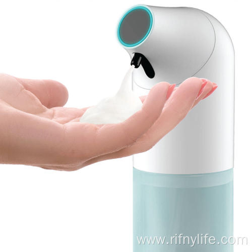 white hands free soap dispenser